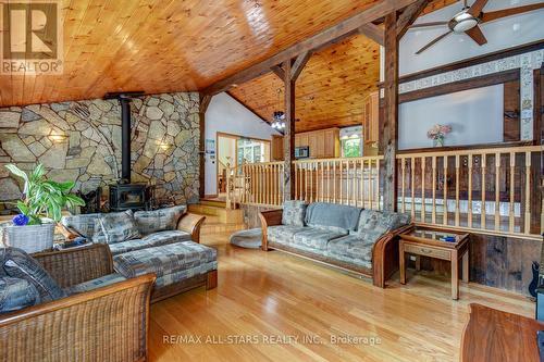 1013 Merrick Drive, Bracebridge, ON - Indoor Photo Showing Living Room With Fireplace