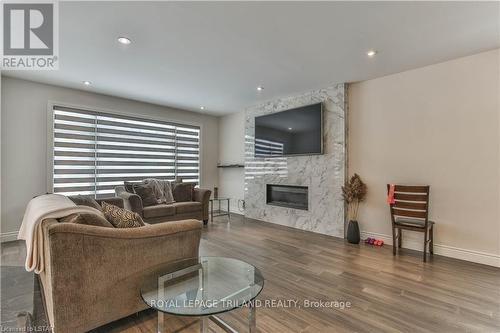 2428 Black Rail Terr, London, ON - Indoor Photo Showing Living Room With Fireplace