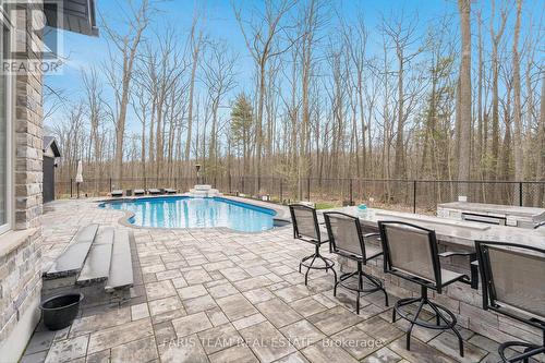 29 Timber Wolf Tr, Springwater, ON - Outdoor With In Ground Pool