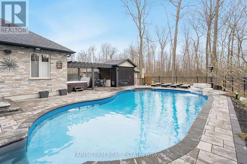 29 Timber Wolf Tr, Springwater, ON - Outdoor With In Ground Pool