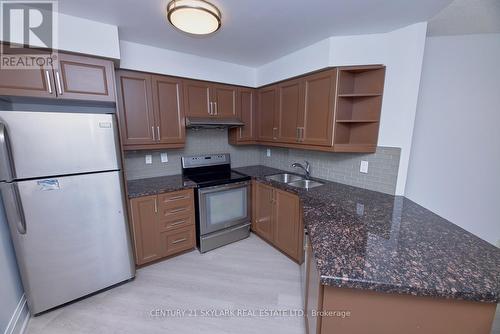 #2311 -3880 Duke Of York Blvd, Mississauga, ON - Indoor Photo Showing Kitchen With Double Sink