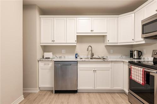 4644 Pettit Avenue|Unit #323, Niagara Falls, ON - Indoor Photo Showing Kitchen With Double Sink