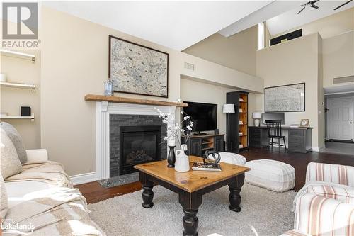 5021 Grandview Bayside Drive, Huntsville, ON - Indoor Photo Showing Living Room With Fireplace