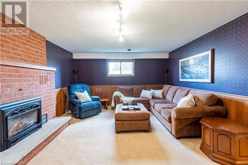 616 Stonebury Crescent, Waterloo, ON - Indoor Photo Showing Living Room With Fireplace