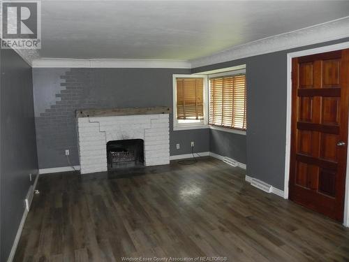 1221 County Rd 22, Lakeshore, ON - Indoor Photo Showing Other Room With Fireplace