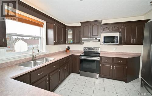 18 Mockler Street, Oromocto West, NB - Indoor Photo Showing Kitchen With Double Sink