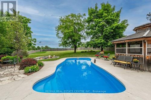 6954 Fife Rd, Guelph/Eramosa, ON - Outdoor With In Ground Pool With Deck Patio Veranda With Backyard