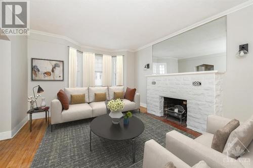 344 Tweedsmuir Avenue, Ottawa, ON - Indoor Photo Showing Living Room With Fireplace