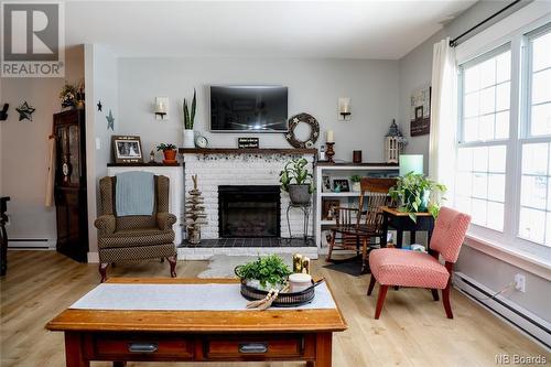 130 Charing Crescent, Fredericton, NB - Indoor Photo Showing Living Room With Fireplace