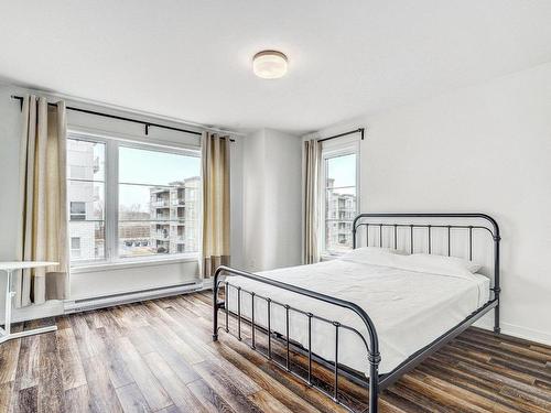 Chambre Ã Â coucher - 7-7200 Rue De Lunan, Brossard, QC - Indoor Photo Showing Bedroom