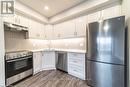 #508 -5698 Main St, Niagara Falls, ON  - Indoor Photo Showing Kitchen With Upgraded Kitchen 