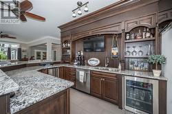 Wet Bar fully equipped with Ice maker, Bar Fridge, and Dishwasher - 