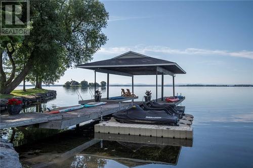 40' long covered boat slip with view of Cairn Island - 20288 County Road 2 Road, South Glengarry, ON - Outdoor With Body Of Water With View