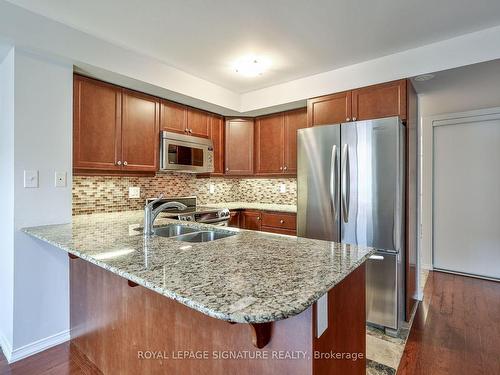 11-667D Warden Ave, Toronto, ON - Indoor Photo Showing Kitchen With Double Sink With Upgraded Kitchen