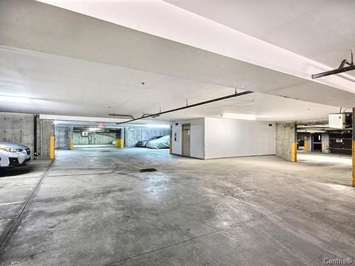 Garage - 408-1500 Rue Palerme, Brossard, QC - Indoor Photo Showing Garage