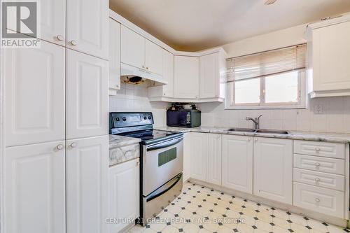 14 Milkwood Ave, Toronto, ON - Indoor Photo Showing Kitchen With Double Sink