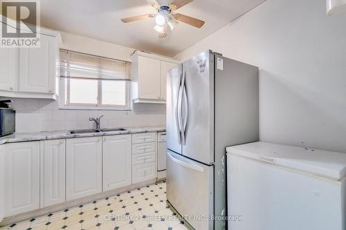 14 Milkwood Ave, Toronto, ON - Indoor Photo Showing Kitchen With Double Sink