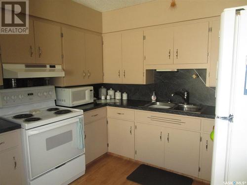 115 Empire Road, Assiniboia, SK - Indoor Photo Showing Kitchen With Double Sink