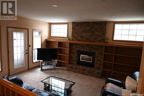 1579 Lee Grayson Crescent N, Regina, SK - Indoor Photo Showing Living Room With Fireplace