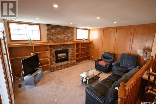 1579 Lee Grayson Crescent N, Regina, SK - Indoor Photo Showing Living Room With Fireplace