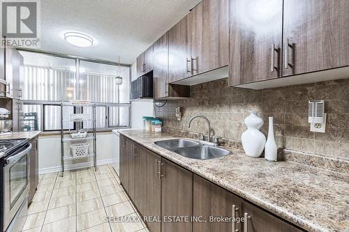 #707 -25 Kensington Rd, Brampton, ON - Indoor Photo Showing Kitchen With Double Sink With Upgraded Kitchen