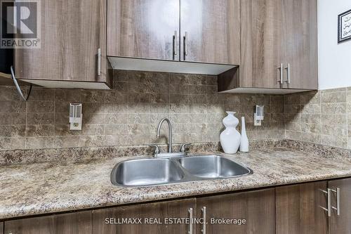 #707 -25 Kensington Rd, Brampton, ON - Indoor Photo Showing Kitchen With Double Sink