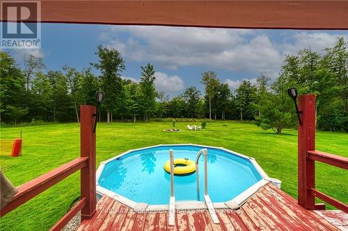 7806 Concession 3 Road N, West Lincoln, ON - Outdoor With Above Ground Pool With Deck Patio Veranda With Backyard