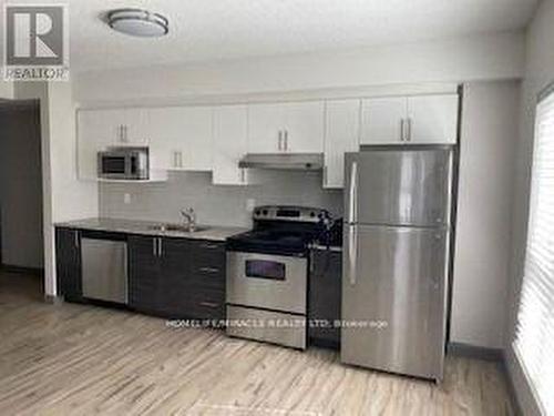 #156 -258A Sunview St, Waterloo, ON - Indoor Photo Showing Kitchen With Stainless Steel Kitchen With Double Sink