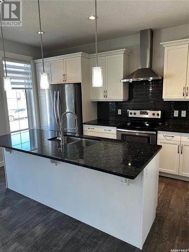4541 E Green Apple Drive, Regina, SK - Indoor Photo Showing Kitchen With Stainless Steel Kitchen With Upgraded Kitchen