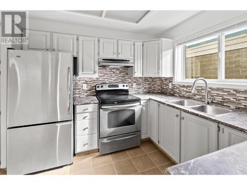 200 Hollywood Road N Unit# 101, Kelowna, BC - Indoor Photo Showing Kitchen With Double Sink