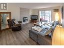 110 Skaha Place Unit# 410, Penticton, BC  - Indoor Photo Showing Living Room With Fireplace 