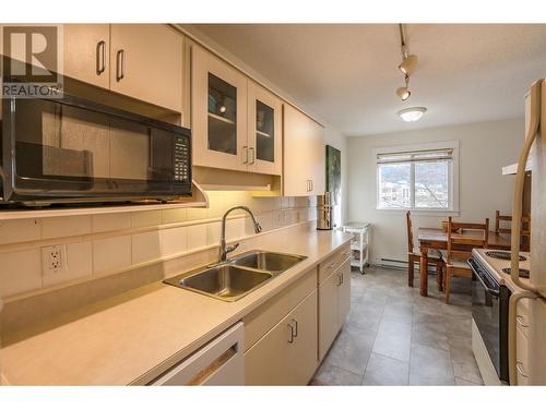 110 Skaha Place Unit# 410, Penticton, BC - Indoor Photo Showing Kitchen With Double Sink