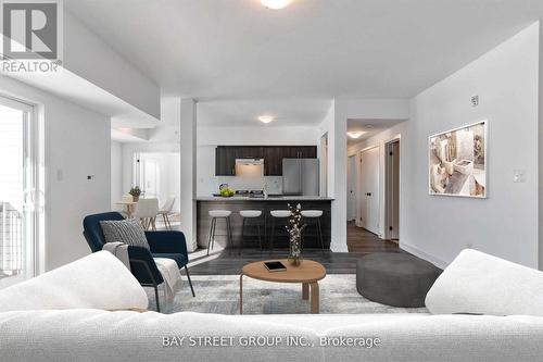 #302 -10 Culinary Lane, Barrie, ON - Indoor Photo Showing Living Room