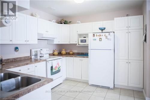 1111 Cannon Street E, Hamilton, ON - Indoor Photo Showing Kitchen With Double Sink