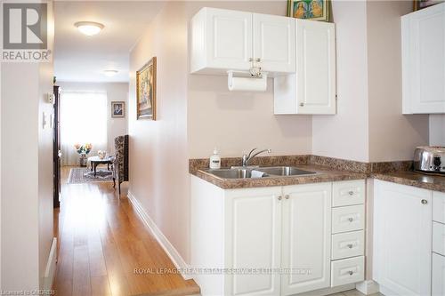 1111 Cannon Street E, Hamilton, ON - Indoor Photo Showing Kitchen With Double Sink