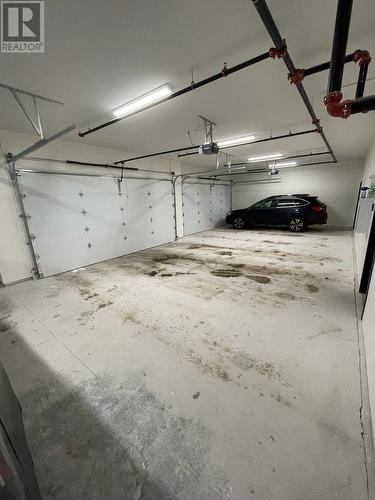 5075 Snowbird Way Unit# 8B, Big White, BC - Indoor Photo Showing Garage