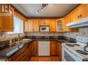 615 6Th Avenue Unit# 2, Keremeos, BC  - Indoor Photo Showing Kitchen With Double Sink 