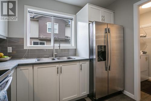 1355 Findlay Road Unit# 107, Kelowna, BC - Indoor Photo Showing Kitchen With Double Sink