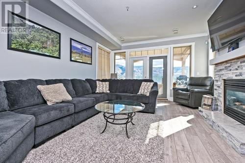 21 Osprey Place, Osoyoos, BC - Indoor Photo Showing Living Room With Fireplace