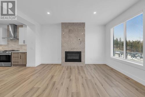 2835 Canyon Crest Drive Unit# 24, West Kelowna, BC - Indoor With Fireplace