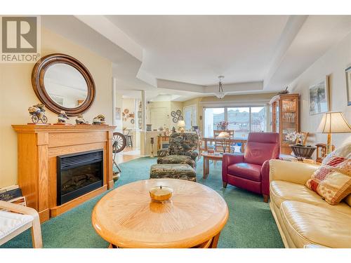 9800 Turner Street Unit# 63, Summerland, BC - Indoor Photo Showing Living Room With Fireplace