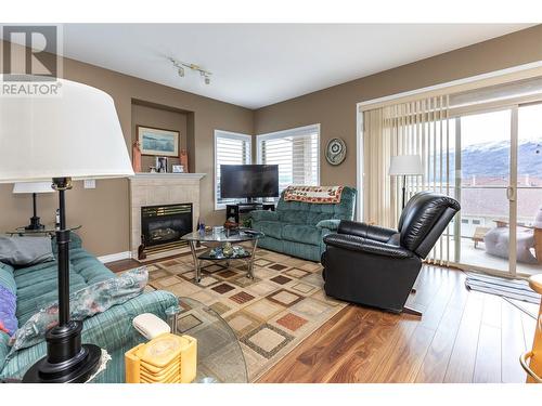 5300 Huston Road Unit# 211, Peachland, BC - Indoor Photo Showing Living Room With Fireplace