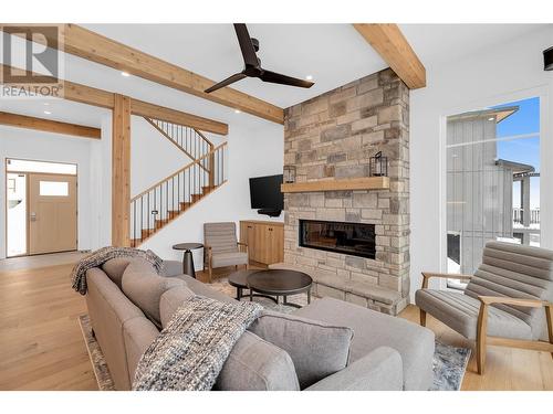 255 Feathertop Way Unit# 82, Big White, BC - Indoor Photo Showing Living Room With Fireplace