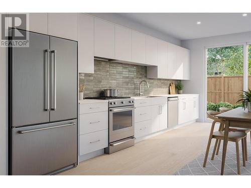 727 Wardlaw Avenue Unit# 3, Kelowna, BC - Indoor Photo Showing Kitchen With Upgraded Kitchen