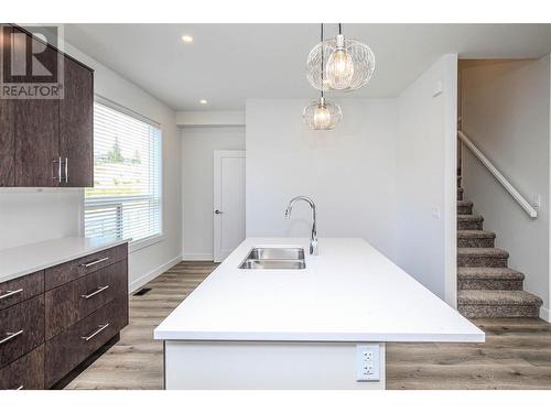 610 Academy Way Unit# 117, Kelowna, BC - Indoor Photo Showing Kitchen With Double Sink