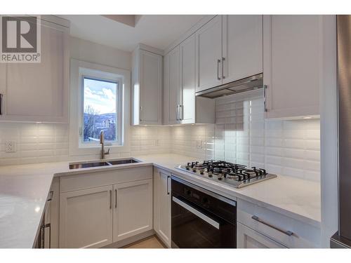1308 Richter Street Unit# 101, Kelowna, BC - Indoor Photo Showing Kitchen With Double Sink With Upgraded Kitchen