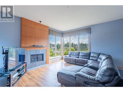 101 Falcon Point Way Unit# 3, Vernon, BC - Indoor Photo Showing Living Room With Fireplace