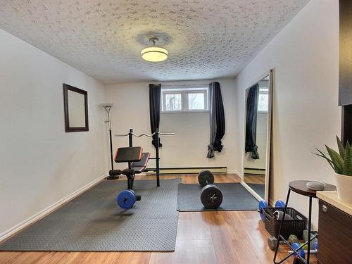 Salle familiale - 581 Av. Hébert, Rouyn-Noranda, QC - Indoor Photo Showing Gym Room