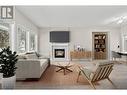 3950 Gallaghers Boulevard S Unit# 11, Kelowna, BC  - Indoor Photo Showing Living Room With Fireplace 