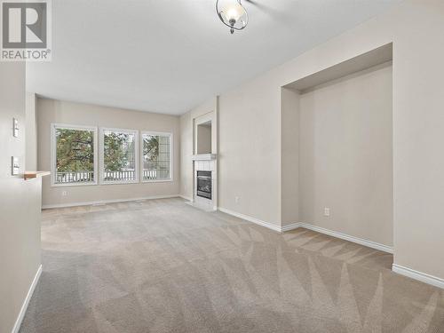 3950 Gallaghers Boulevard S Unit# 11, Kelowna, BC - Indoor With Fireplace